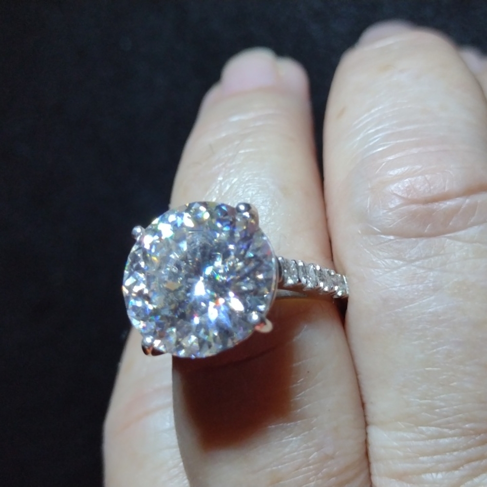 Ring. 6 ctw moisenite diamonds. Size 8. Platinum over silver.